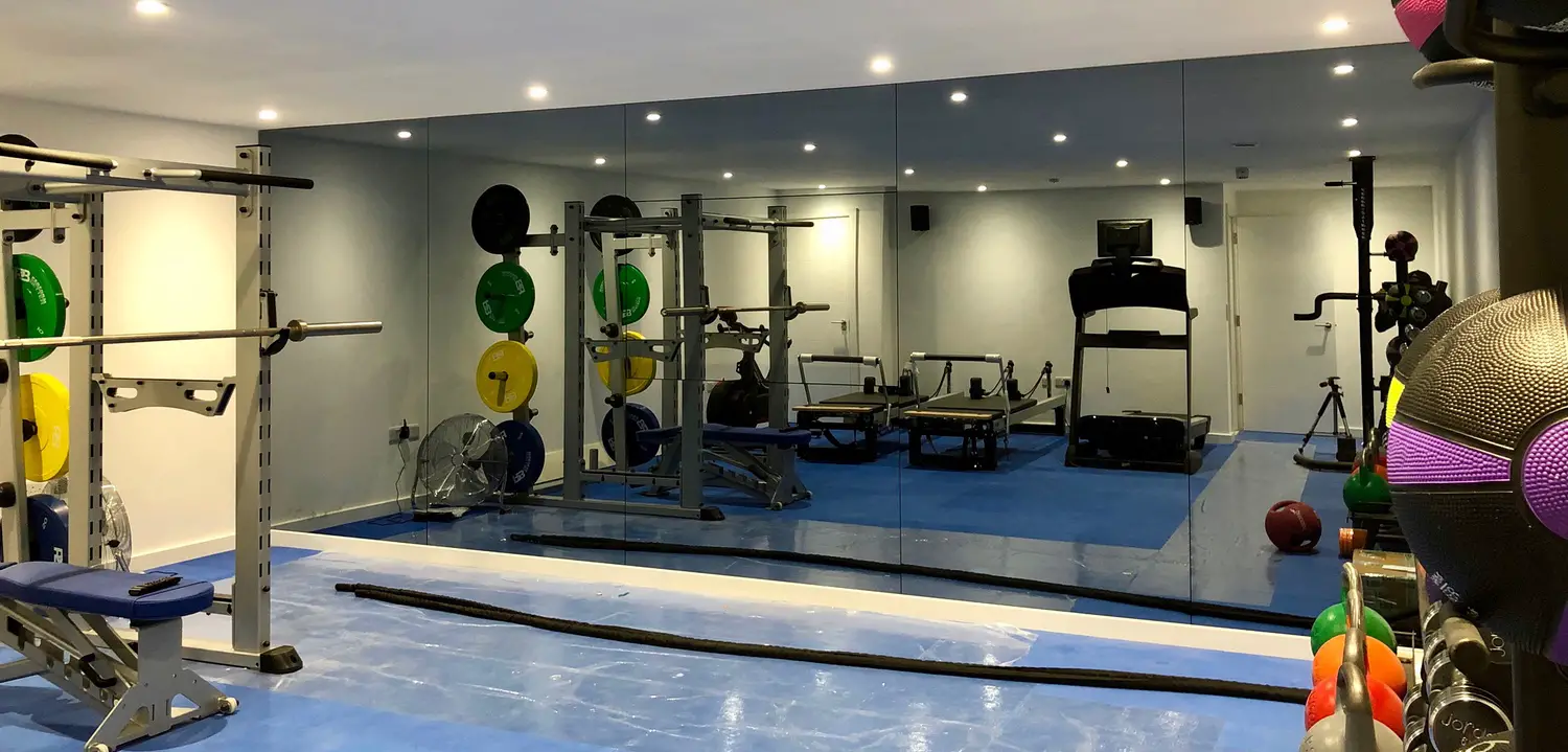How Frameless Gym Mirror Can Be A Sufficient Item For A Home Gym